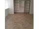 Bedroom boasts tile flooring and built in shelves for storage at 1936 St Lawrence Dr, Las Vegas, NV 89108