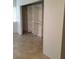 Spacious bedroom with tile floors and a built-in closet at 1936 St Lawrence Dr, Las Vegas, NV 89108
