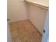 Inside closet showing tile flooring and shelving at 1936 St Lawrence Dr, Las Vegas, NV 89108