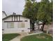 Inviting single-story home with maintained lawn, mature trees, and neutral color scheme at 1936 St Lawrence Dr, Las Vegas, NV 89108