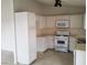 Functional kitchen with ample white cabinets and modern appliances at 1936 St Lawrence Dr, Las Vegas, NV 89108
