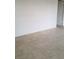 Bright living room with white walls and tile flooring, offering a versatile living space at 1936 St Lawrence Dr, Las Vegas, NV 89108