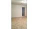 Open living room featuring tile floors and neutral walls, providing a bright and airy space at 1936 St Lawrence Dr, Las Vegas, NV 89108