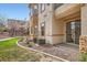 Backyard featuring a patio and lush lawn with desert-friendly landscaping at 201 Kaelyn St # 4, Boulder City, NV 89005