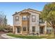 Attractive townhome exterior with private balcony, manicured landscaping and stucco facade at 201 Kaelyn St # 4, Boulder City, NV 89005