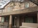 Image of the home's stucco exterior, backyard patio, and upper balcony at 206 Valerian St, Henderson, NV 89015