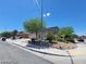Two-story home with a three-car garage and tidy landscaping, set on a sunny day at 206 Valerian St, Henderson, NV 89015
