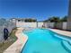 Backyard pool with a spa and well-maintained surrounding area, perfect for relaxation at 206 Valerian St, Henderson, NV 89015