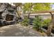 Outdoor stone fireplace and patio create an entertainer's dream backyard at 2221 S Tioga Way, Las Vegas, NV 89117