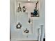 A collection of decorative objects are displayed inside of this recessed wall shelf at 2221 S Tioga Way, Las Vegas, NV 89117