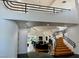 Grand foyer with a staircase and views into the spacious living area at 2221 S Tioga Way, Las Vegas, NV 89117