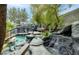 Long indoor swimming pool with a vaulted ceiling and plenty of natural light at 2221 S Tioga Way, Las Vegas, NV 89117