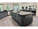 Kitchen island with sink, appliances and a modern design in a spacious area at 2221 S Tioga Way, Las Vegas, NV 89117
