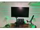 This modern office features LED lighting and a large screen for an immersive work experience at 2221 S Tioga Way, Las Vegas, NV 89117