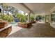 Large outdoor patio area overlooking a backyard pool, ideal for entertaining and relaxing at 2221 S Tioga Way, Las Vegas, NV 89117