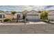 Charming single-story home with a well-maintained front yard and a two-car garage, set in a quiet neighborhood at 2255 Bildad Dr, Henderson, NV 89044