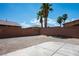 Spacious backyard with fresh gravel and a block wall at 2305 Dalton Ridge Ct, North Las Vegas, NV 89031