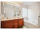 Bathroom with double sinks, soaking tub, and separate shower is perfect for relaxing after a long day at 2305 Dalton Ridge Ct, North Las Vegas, NV 89031