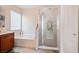 Bright bathroom featuring a soaking tub and a glass enclosed shower at 2305 Dalton Ridge Ct, North Las Vegas, NV 89031