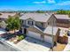Two-story home with a two-car garage and well-maintained landscaping at 2305 Dalton Ridge Ct, North Las Vegas, NV 89031