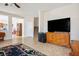 Bright living room showing the open concept leading to the kitchen and staircase at 2305 Dalton Ridge Ct, North Las Vegas, NV 89031