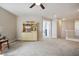 Open living room with plush carpeting, and natural light at 2305 Dalton Ridge Ct, North Las Vegas, NV 89031
