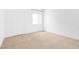 Well-lit bedroom featuring neutral carpeting and bright walls at 2615 W Gary Ave # 1041, Las Vegas, NV 89123