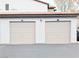 Two-car garages with painted garage doors offer convenient parking at 2615 W Gary Ave # 1041, Las Vegas, NV 89123