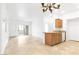 Open concept living room with granite countertops and tile flooring at 2615 W Gary Ave # 1041, Las Vegas, NV 89123