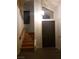 Welcoming entryway featuring modern lighting, a staircase, and convenient access at 2720 Knightsbridge Rd, Henderson, NV 89074