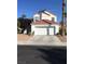 Charming two-story home with a two car garage, tile roof, and well-maintained landscaping at 2720 Knightsbridge Rd, Henderson, NV 89074