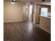 Spacious living room with hardwood floors and a ceiling fan providing a comfortable atmosphere at 2720 Knightsbridge Rd, Henderson, NV 89074