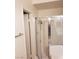 Shower with a chrome frame and handheld shower head at 2720 Knightsbridge Rd, Henderson, NV 89074