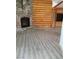 Cozy living space with a stone fireplace, wood accents, and modern flooring at 311 Crestview Dr, Las Vegas, NV 89124
