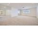 Bedroom featuring mirrored walls, carpet flooring and a window offering a blank canvas for personalization at 3235 S Tioga Way, Las Vegas, NV 89117