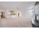 Bright living room featuring recessed lighting and a decorative wet bar with a mirrored backsplash at 3235 S Tioga Way, Las Vegas, NV 89117