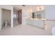 Bathroom featuring a glass door shower, a large vanity with dual sinks, and ample lighting at 3235 S Tioga Way, Las Vegas, NV 89117