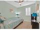 Comfortable bedroom with carpet, window with shutters, and ceiling fan at 337 Mattie Brook Ave, Henderson, NV 89015