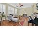 Elegant living room with plantation shutters, hardwood floors, and an open layout, perfect for entertaining at 337 Mattie Brook Ave, Henderson, NV 89015