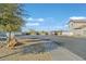 Street view of home featuring adjacent parking area and desert landscaping at 337 Mattie Brook Ave, Henderson, NV 89015