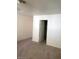 Bedroom with carpet flooring and a door leading to closet space at 3480 E Hacienda Ave, Las Vegas, NV 89120