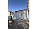 Exterior view of a white brick home with a gated entrance at 3480 E Hacienda Ave, Las Vegas, NV 89120
