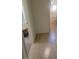 Hallway with tile flooring connecting to a carpeted area and a bathroom at 3480 E Hacienda Ave, Las Vegas, NV 89120