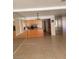 Open-concept kitchen boasts warm wood cabinetry, modern appliances, and seamless transition to living area at 3480 E Hacienda Ave, Las Vegas, NV 89120