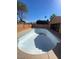 View of an empty pool in the backyard at 3480 E Hacienda Ave, Las Vegas, NV 89120