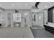 Large bathroom with modern vanity, walk-in shower, and sleek bathtub at 3860 Hildebrand Ln, Las Vegas, NV 89121