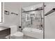 Elegant bathroom showcasing a glass-enclosed tub, offering a spa-like experience with modern fixtures at 3860 Hildebrand Ln, Las Vegas, NV 89121