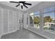 Bedroom featuring built-in shelving, natural light, and view of the pool at 3860 Hildebrand Ln, Las Vegas, NV 89121