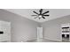 Bright bedroom with ample closet space, featuring a ceiling fan for added comfort at 3860 Hildebrand Ln, Las Vegas, NV 89121
