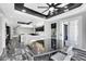Open-concept dining area showcasing kitchen access and modern finishes, perfect for entertaining guests at 3860 Hildebrand Ln, Las Vegas, NV 89121